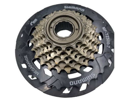 Кассета трещотка 7 скоростей AMFTZ5007428CP 2-6030 TOURNEY 7х14-28 HG/UG с защитой коричневая SHIMANO